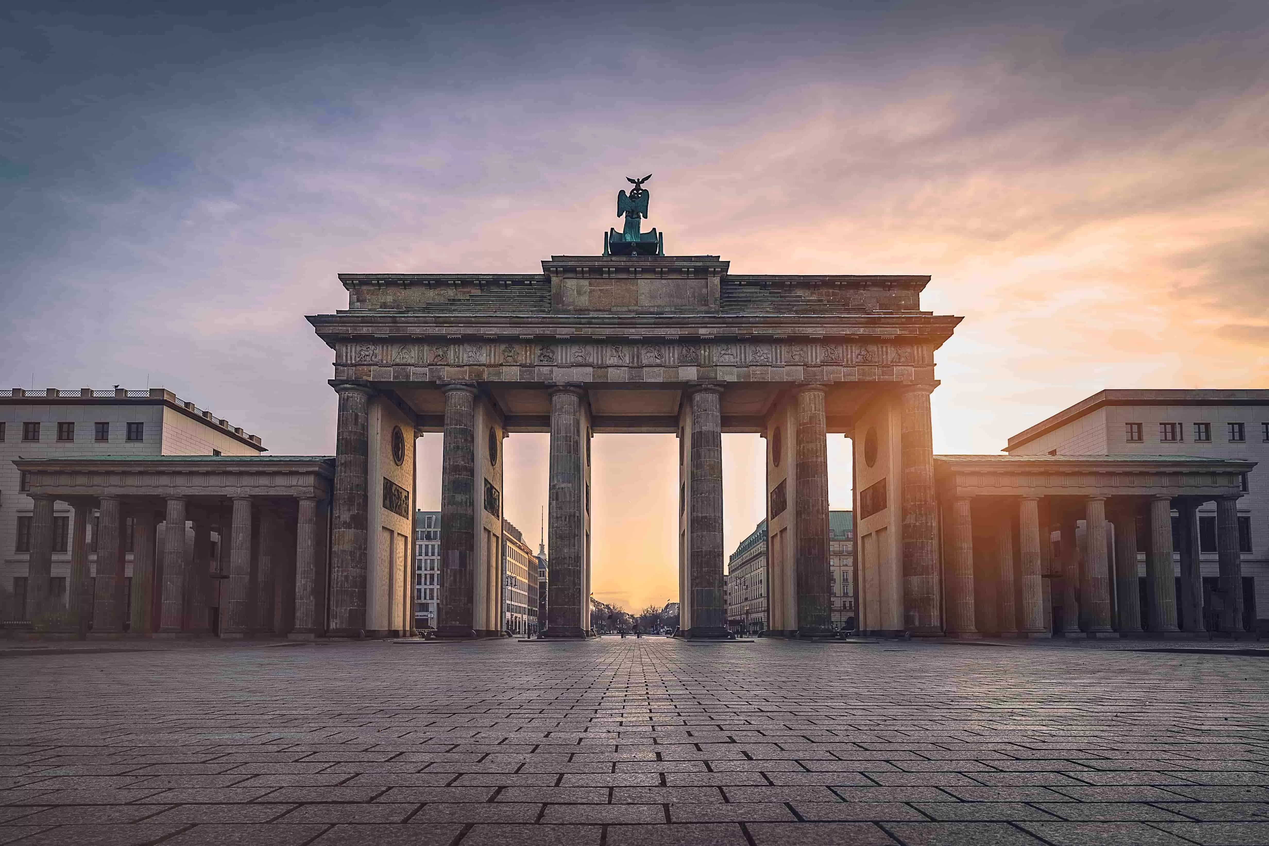 brandenburg-gate-illuminated-sunset-front-view-min